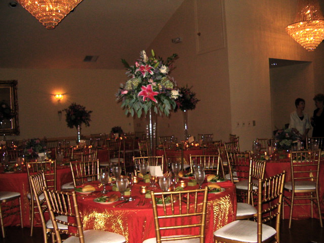 Table with tall flower arrangement